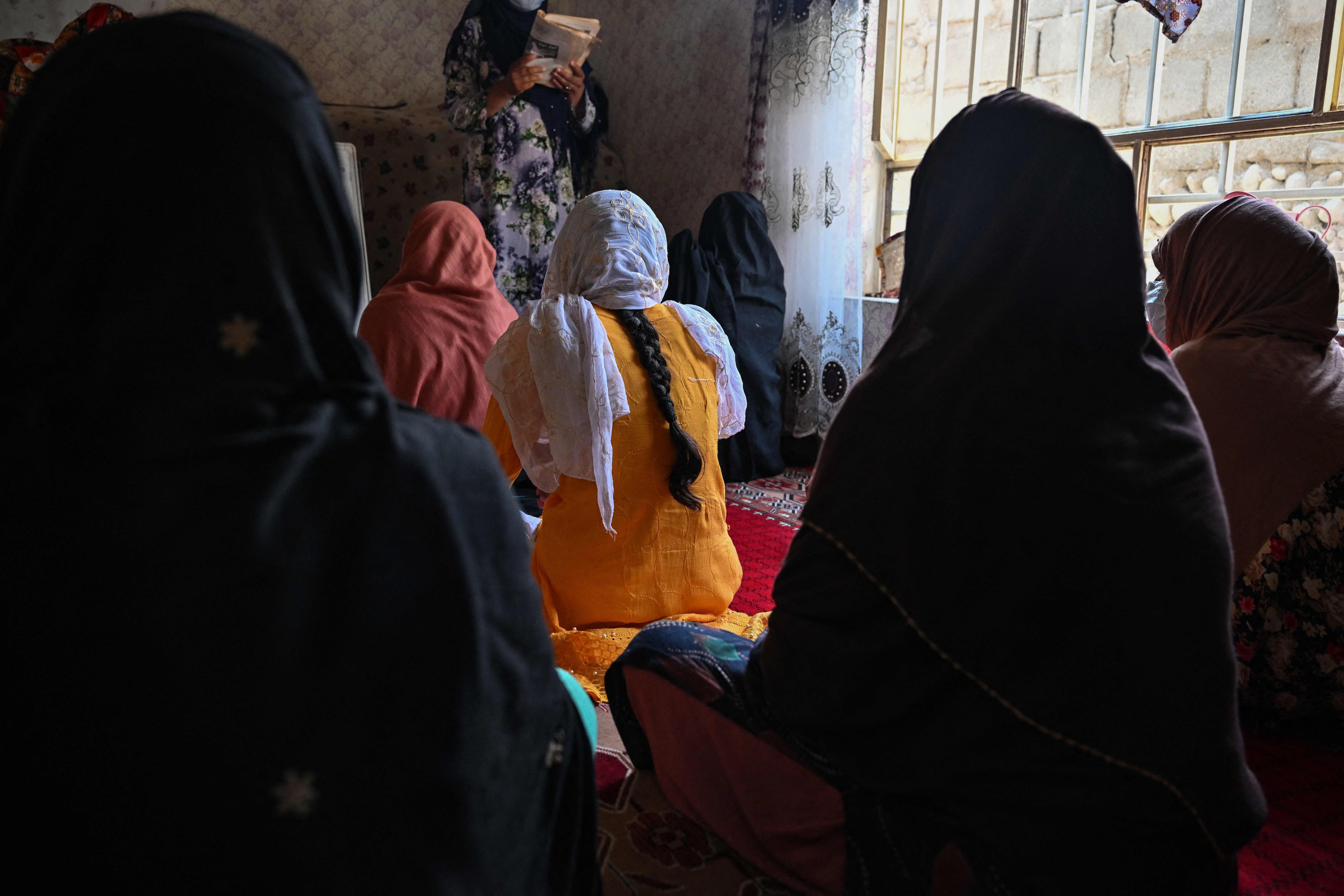 Girls studying in a secret school at an undisclosed location in Afghanistan. (AFP)