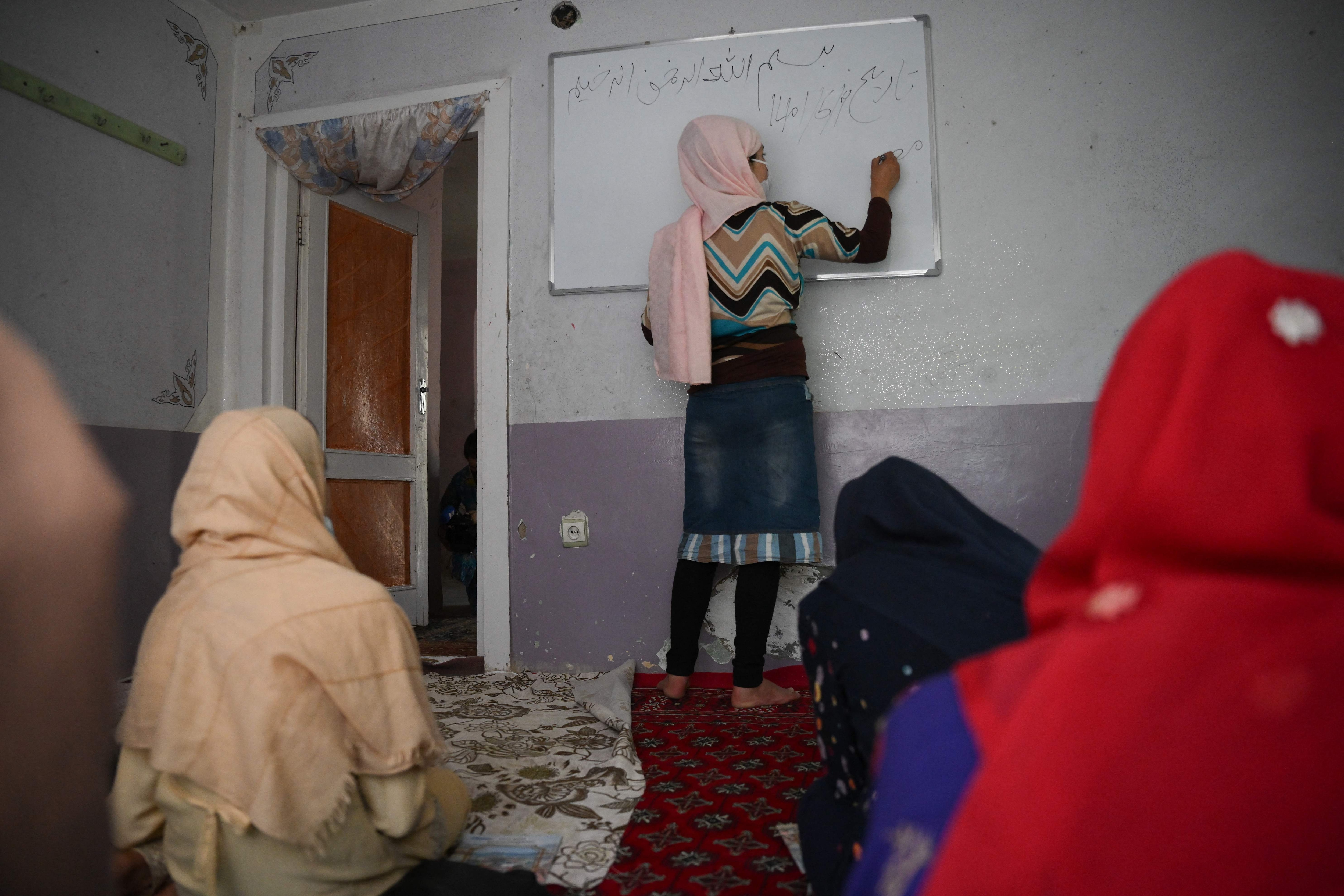 Hundreds of thousands of girls and young women have been deprived of the chance of education since the Taliban returned to power a year ago, but their thirst for learning has not lessened. (AFP)