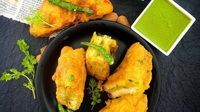 Bread Pakoda: Bring this famous Indian street food to the doors of your house this Raksha Bandhan. These savoury bread fritters are stuffed with mashed potato and soaked in a spiced batter of gram flour and then deep fried to perfection. (Instagram/@bornhungrybypayal) Bread Pakoda: Bring this famous Indian street food to the doors of your house this Raksha Bandhan. These savoury bread fritters are stuffed with mashed potato and soaked in a spiced batter of gram flour and then deep fried to perfection. (Instagram/@bornhungrybypayal)