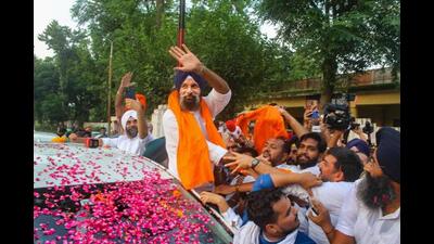 Shiromani Akali Dal (SAD) leader Bikram Singh Majithia being greeted after being released from prison on bail, in Patiala district, Wednesday. (PTI)