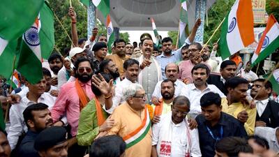 Uttar Pradesh deputy chief Minister Keshav Prasad Maurya with BJP leaders and supporters participate in a 'Tiranga Yatra', in Prayagraj on Wednesday. (ANI)