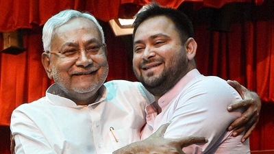 Bihar Chief Minister Nitish Kumar being greeted by Deputy Chief Minister Tejashwi Yadav after taking oath, at Raj Bhavan in Patna. (PTI) Bihar Chief Minister Nitish Kumar being greeted by Deputy Chief Minister Tejashwi Yadav after taking oath, at Raj Bhavan in Patna. (PTI)