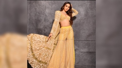Raksha Bandhan 2022: Kiara Advani is a total glam queen and can rock any outfit. Yellow is the colour of the season and can make any outfit look more cheerful. The three-piece sharara set can be a perfect Rakhi outfit. Drop the dupatta and replace it with a long jacket for a stylish and trendy look. You can pair it up with a silver choker and minimal makeup to complete the look. (Instagram ) Raksha Bandhan 2022: Kiara Advani is a total glam queen and can rock any outfit. Yellow is the colour of the season and can make any outfit look more cheerful. The three-piece sharara set can be a perfect Rakhi outfit. Drop the dupatta and replace it with a long jacket for a stylish and trendy look. You can pair it up with a silver choker and minimal makeup to complete the look. (Instagram )