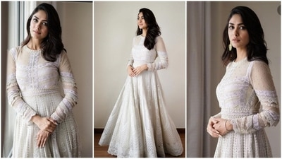 Raksha Bandhan 2022: Mrunal Khakur looks like a total goddess in the ivory white gown. No matter what the occassion is, white always looks wonderful because it is such a calming colour. Even with basic makeup and accessories, you may look stunning in a gorgeous white gown. The outfit will stand out and undoubtedly turn heads. (Instagram ) Raksha Bandhan 2022: Mrunal Khakur looks like a total goddess in the ivory white gown. No matter what the occassion is, white always looks wonderful because it is such a calming colour. Even with basic makeup and accessories, you may look stunning in a gorgeous white gown. The outfit will stand out and undoubtedly turn heads. (Instagram )