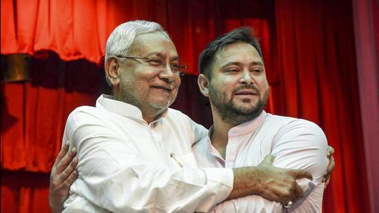 Bihar chief minister Nitish Kumar with his deputy, Tejashwi Yadav, at Raj Bhavan in Patna on Wednesday. (PTI)