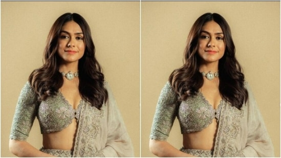 Mrunal looked every bit gorgeous in a pastel grey lehenga as she posed for the pictures.(Instagram/@mrunalthakur)