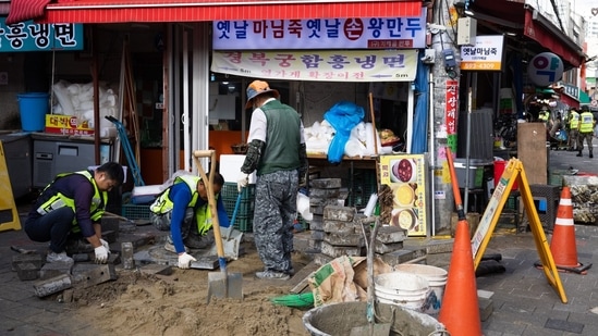 Transport authorities were able to restore rail services after the storm flooded train tracks and sent cascades of water into several subway stations.(Bloomberg)