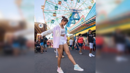 Pooja Hegde raised the 'cool' quotient by pairing her outfit with different coloured converse.(Instagram/@hegdepooja)