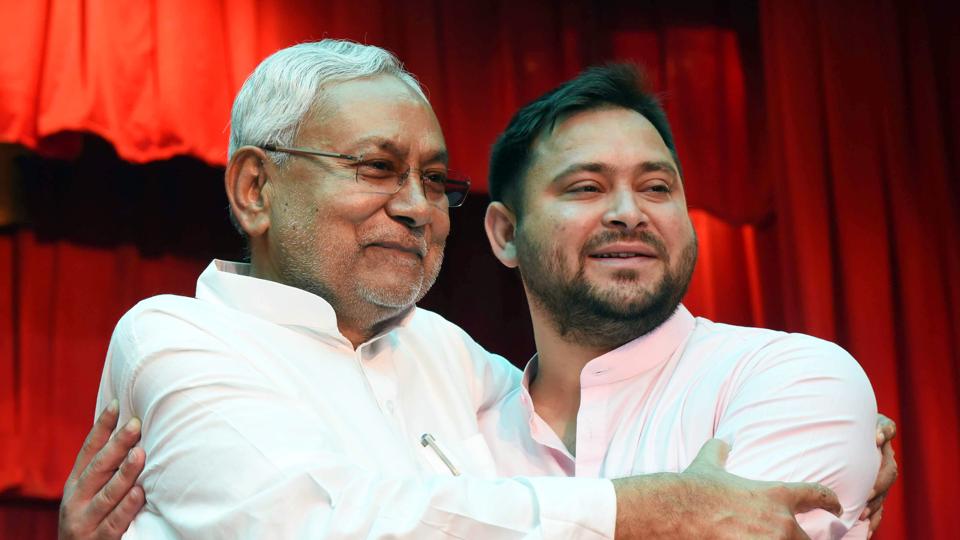 JDU leader Nitish Kumar embraces RJD leader Tejashwi Yadav after they take oath as chief minister and deputy chief minister, in Patna on Wednesday. (ANI) JDU leader Nitish Kumar embraces RJD leader Tejashwi Yadav after they take oath as chief minister and deputy chief minister, in Patna on Wednesday. (ANI)