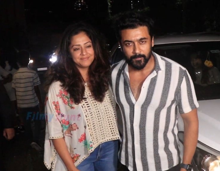 Jyotika and Suriya posed for paparazzi in Mumbai during a recent outing with their children. Jyotika and Suriya posed for paparazzi in Mumbai during a recent outing with their children.