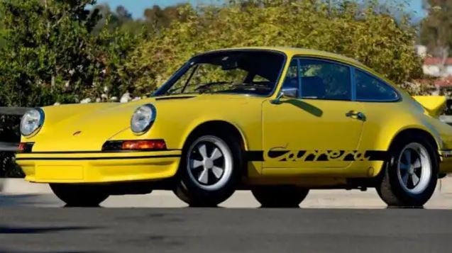 The 1973 Porsche 911 Carrera RS 2.7 could accelerate to 100km/h in 6.3 seconds. (Sourced)
