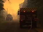 Firefighters deploy to fight a fire in a forest near homes in Clefs-Val-D'Anjou, near La Fleche, western France, where flames have ravaged more than 500 hectares of forests since a fire started on August 8.(AFP) Firefighters deploy to fight a fire in a forest near homes in Clefs-Val-D'Anjou, near La Fleche, western France, where flames have ravaged more than 500 hectares of forests since a fire started on August 8.(AFP)