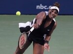Serena Williams, of the United States, serves to Belinda Bencic, of Switzerland, during the National Bank Open tennis tournament Wednesday, Aug. 10, 2022, in Toronto.(AP)