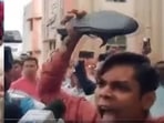 In a video shared by news agency ANI, a large number of people were seen gathered in front of the special court which remanded him in 10-day custody of the CBI.