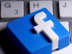 FILE PHOTO: A 3D-printed Facebook logo is seen placed on a keyboard in this illustration taken March 25, 2020. FILE PHOTO: A 3D-printed Facebook logo is seen placed on a keyboard in this illustration taken March 25, 2020. 