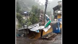 A screen shot of one of the shops collapsing in Anni tehsil of Kullu district on Thursday morning. (HT Photo)