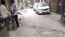 Ludhiana, India- August 11, 2022 : Potholed roads in old city areas in Ludhiana on Thursday, August 11, 2022. (Photo Hindustan Times) (HT PHOTO)