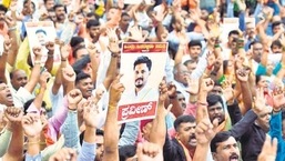 Protesters raising slogans and demanding action against those behind the murder of worker Praveen Nettaru in Dakshina Kannada. (PTI Image)