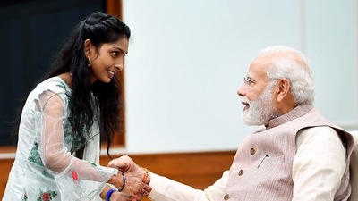 Prime Minister Narendra Modi celebrated Raksha Bandhan on Thursday with the daughters of staff members working at his office. In the photos, young girls can be seen tying rakhis on his wrist. (ANI ) Prime Minister Narendra Modi celebrated Raksha Bandhan on Thursday with the daughters of staff members working at his office. In the photos, young girls can be seen tying rakhis on his wrist. (ANI )