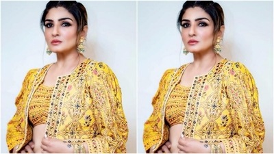 Raveena played muse to fashion designer house Ne’chi and picked the yellow lehenga from their shelves. (Instagram/@officialraveenatandon)