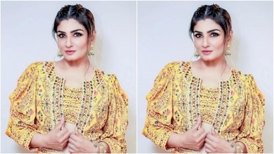 In statement yellow jhumkas and bangles from the house of PNG Jewellers, Raveena further accessorised her look for the day. (Instagram/@officialraveenatandon)