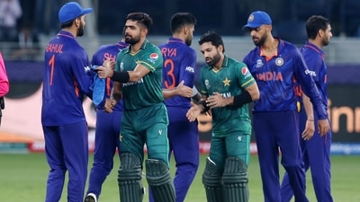 Mohammad Rizwan and Babar Azam shake hands with Indian players (REUTERS/File Photo)