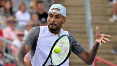 Montreal, QC, Canada; Nick Kyrgios (AUS) hits a backhand against Daniil Medvedev (not pictured) in second round play at IGA Stadium. (USA TODAY Sports)