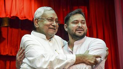 Bihar chief minister Nitish Kumar with his deputy Tejashwi Yadav during their swearing-in ceremony on Wednesday. (PTI) Bihar chief minister Nitish Kumar with his deputy Tejashwi Yadav during their swearing-in ceremony on Wednesday. (PTI)