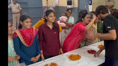 The jail officials thoroughly checked the sweet boxes and hand bags of the women. Security has been tightened at different places inside and outside the jails. (HT PHOTO) The jail officials thoroughly checked the sweet boxes and hand bags of the women. Security has been tightened at different places inside and outside the jails. (HT PHOTO)