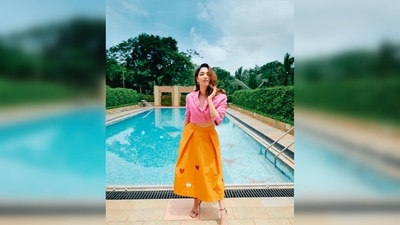 Tamannaah Bhatia accessorised her look with minimal jewellery and completed it with the most expensive jewellery a woman can wear, her smile. (Instagram/@stylebyami) Tamannaah Bhatia accessorised her look with minimal jewellery and completed it with the most expensive jewellery a woman can wear, her smile. (Instagram/@stylebyami)
