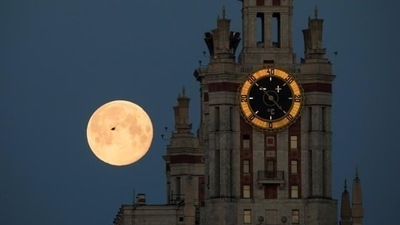 The Supermoon is seen behind the Lomonosov Moscow State University in Moscow, Russia, on May 2020. (Reuters) The Supermoon is seen behind the Lomonosov Moscow State University in Moscow, Russia, on May 2020. (Reuters)