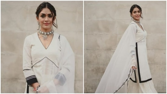 Mrunal Thakur earlier treated her Instagram family with beautiful pictures of herself in a white kurta set with black borders. She accessorised her look with oxidised silver jewellery.(Instagram/@mrunalthakur)