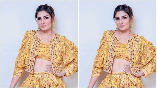 Raveena teamed a yellow blouse printed in minimal patterns in multiple colours with a long flowy yellow skirt. She added more drama to her look with a cropped yellow jacket with puffed sleeves and moti details at the borders.(Instagram/@officialraveenatandon)