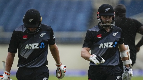 New Zealand's captain Kane Williamson, right, and teammate Glenn Phillips(AP) New Zealand's captain Kane Williamson, right, and teammate Glenn Phillips(AP)