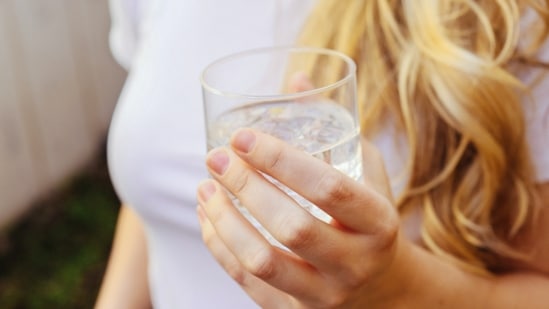 Drink water: Drinking a glass of water on an empty stomach every day provides great health benefits. It helps in cleansing your bowels and regulates your digestive tract.(Unsplash)