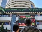 People watch the Sensex on a screen outside Bombay Stock Exchange (BSE) in Mumbai. (PTI File Photo) People watch the Sensex on a screen outside Bombay Stock Exchange (BSE) in Mumbai. (PTI File Photo)
