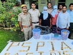 Delhi: A photo of the accused along with officials was shared by news agency ANI. Delhi: A photo of the accused along with officials was shared by news agency ANI. 