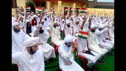 Students of Muslim community during a flag-hoisting ceremony organised as a part of 'Har Ghar Tiranga' campaign at Bathindi in Jammu on Friday. (ANI)