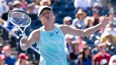 Iga Swiatek reacts during her defeat to Beatriz Haddad Maia in National Bank Open tennis action in Toronto, Thursday, August 11, 2022. (AP)
