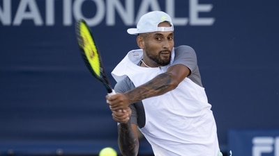 Nick Kyrgios, of Australia, returns to compatriot Alex de Minaur during the National Bank Open tennis tournament Thursday (AP)