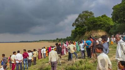 Seventeen people are still missing while three bodies were found after a mid-size boat capsized in the Yamuna River in the Banda district, officials said on Friday. (PTI) Seventeen people are still missing while three bodies were found after a mid-size boat capsized in the Yamuna River in the Banda district, officials said on Friday. (PTI)