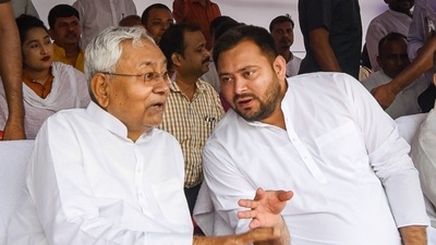 Bihar Chief Minister Nitish Kumar with Deputy CM Tejashwi Yadav at a function after paying tributes at Shaheed Smarak, in Patna, Thursday, Aug 11, 2022. (PTI)