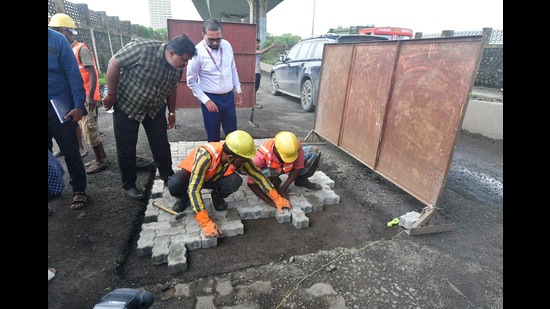According to senior civic officials, the Geo-Polymer mix is a combination of sand, stone and polymer that will be used in filling the potholes. (Bhushan Koyande/HT Photo) According to senior civic officials, the Geo-Polymer mix is a combination of sand, stone and polymer that will be used in filling the potholes. (Bhushan Koyande/HT Photo)