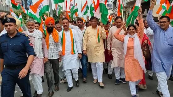 BJP Haryana president OP Dhankar on Friday led the ‘Tiranga Yatra’ at Karnal. It was carried out under Azadi ka Amrit Mahotsav campaign. (HT Photo)