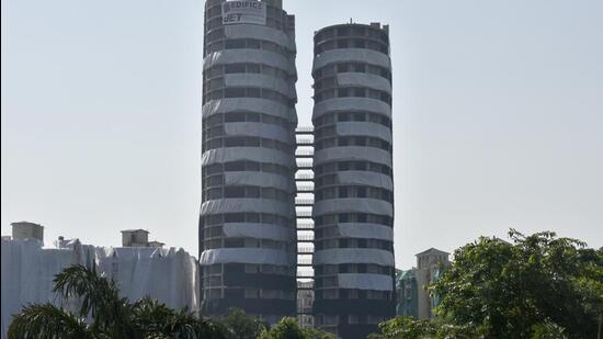 The Supertech towers were ordered to be demolished by the Supreme Court on August 31 last year on a petition filed by Supertech Emerald Court Apartment Owners’ Association. (Sunil Ghosh/HT Photo)