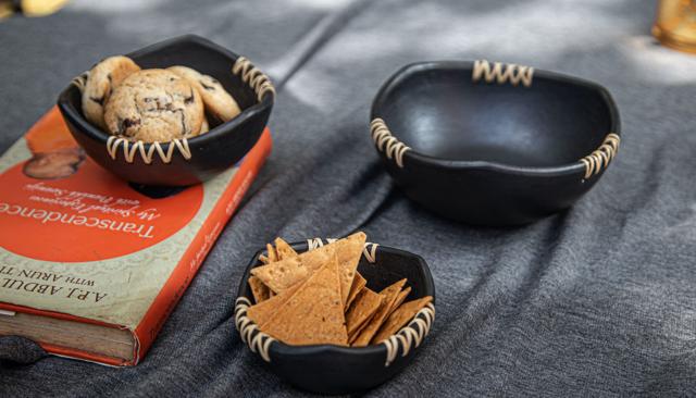 These aesthetic handmade Longpi pottery bowls made with black clay found in Manipur are ideal for snacks to accompany your drinks. (Longpi Ebony Bowls by Soignne) These aesthetic handmade Longpi pottery bowls made with black clay found in Manipur are ideal for snacks to accompany your drinks. (Longpi Ebony Bowls by Soignne)