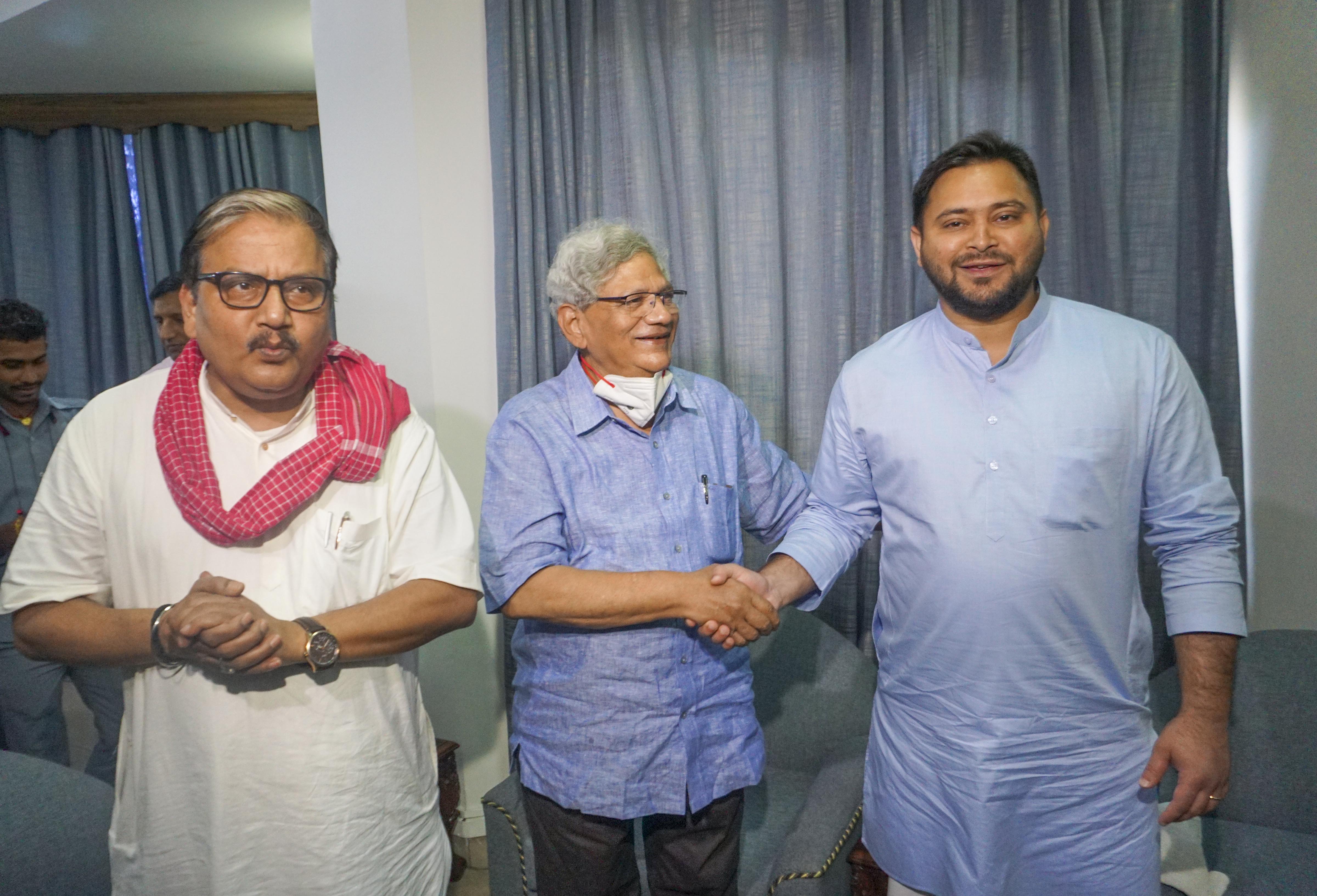 Bihar deputy CM Tejashwi Yadav with CPI (M) general secretary Sitaram Yechury and RJD leader Manoj Kumar Jha in New Delhi on Friday. (PTI) Bihar deputy CM Tejashwi Yadav with CPI (M) general secretary Sitaram Yechury and RJD leader Manoj Kumar Jha in New Delhi on Friday. (PTI)