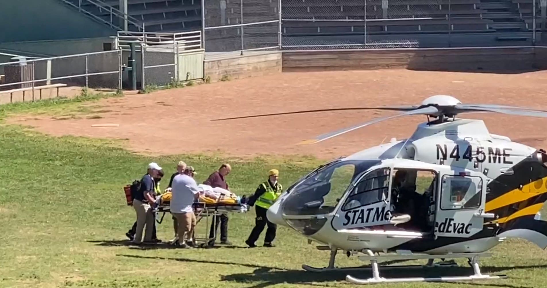 Videograb from aTwitter user showing Salman Rushdie being loaded onto a medical evacuation helicopter at Chautauqua, New York. (AFP) Videograb from aTwitter user showing Salman Rushdie being loaded onto a medical evacuation helicopter at Chautauqua, New York. (AFP)