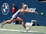 Romania's Simona Halep stretches to reach a shot from United States' Coco Gauff during Women's National Bank Open tennis match(AP) Romania's Simona Halep stretches to reach a shot from United States' Coco Gauff during Women's National Bank Open tennis match(AP)