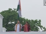 Union Home Minister Amit Shah and his wife Sonal Shah unfurled the tricolour at their residence in New Delhi on Saturday.(ANI)